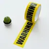Fita de aviso com logo de marcação de decoração, cor de fundo amarelo, letras pretas, rolo grande, largura 4,8 cm, comprimento 25 metros
