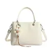 Bolso de mano de alta gama estilo coreano para mujer, nuevo modelo de otoño 2026, bolso de hombro de gran capacidad para el día a día, bolso cruzado tipo cubo versátil