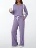 Conjunto informal de punto acanalado cepillado de dos piezas para otoño/invierno 2026, europeo y americano, con mangas largas holgadas y pantalones largos