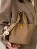 Bolso Cubo Retro para Mujer 2025 Invierno Nuevo Bolso Tote Coreano Simple Gran Capacidad Hombro Único Cruzado Bolso de Moda