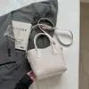 Bolso con patrón tejido único 2026 nuevo bolso cruzado versátil vintage bolso de mano para mujer bolso cubo bolso cruzado para el día a día