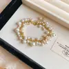 Nuevo Conjunto de Collar Pulsera Pendientes con Borla de Perlas de Nicho para Mujer Moda Lujo Ligero Accesorios de Alta Gama