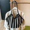 Bolsa Tote Listrada Vazada Estilo Preguiçoso para Ombro Feminina 2026 Nova Grande Capacidade Moda Casual para o Dia a Dia