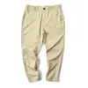 Liquidación mercancía de comercio exterior últimas unidades etiqueta cortada pantalones casuales de sarga de algodón elástico ajustados rectos de negocios para hombre primavera y otoño pantalones para hombre
