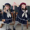 Ropa Infantil Faldas para Niñas Cuello de Academia Uniforme Escolar Vestido Vestido de Princesa Nuevo Estilo Primavera/Otoño 2026 Ropa Infantil de Comercio Exterior