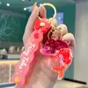 Chaveiro Pingente Golfinho de Areia Movediça com Contraste de Cores Série Oceano Decoração de Mochila de Estudante Presente para Amigos
