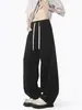 Calça de moletom desconstruída estilo americano para homens, nova marca da moda outono/inverno 2026, calças esportivas soltas, calças casuais versáteis de perna reta da alta rua