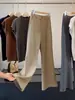 Traje caqui de temperamento moderno pantalones microacampanados mujer otoño nuevo cintura alta drapeado corte ajustado estiliza versátil casual pantalones largos