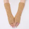 Guantes de rombos de longitud media G-5 otoño e invierno Nuevo tejido jacquard de lana cálido para hombre y mujer Guantes de dedos abiertos Mangas falsas tejidas