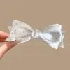 Pinza de plátano de moda y elegante para mujer, versátil para el uso diario, pinza para el pelo de lunares de alto valor, accesorio para el pelo de pinza de garra de lazo de estilo coreano simple