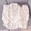 Pijama de mujer estilo Ins para primavera y otoño, estilo fino de algodón nube 2026, conjunto de ropa de casa de dibujos animados dulce de manga larga y pantalón largo