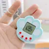 Máquina electrónica de mascotas mini de mano más vendida, máquina de juego de mascotas virtuales, llavero, colgante de regalo pequeño creativo