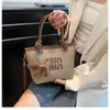 Bolso de Mano Tipo Cesta de Verduras Nuevo de Invierno Transfronterizo para Mujer 2025 Bolso de Hombro de Gama Alta de Moda Versátil para el Trabajo Bolso Cruzado