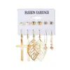 Aretes Nuevos Transfronterizos de Perla de Mariposa Traje Combinación Temperamento Europeo y Americano Sentido del Diseño Aleación Aretes Retro Estilo Ins