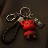 Pingente requintado de alta qualidade anti-perda chaveiro de carro pingente de mochila boneca casal estrela urso chaveiro atacado