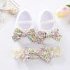 Zapatos para bebé recién nacido primavera 2022 0-6-9 meses zapatos de bebé suelas blandas zapatos para niños pequeños estilo INS zapatos de princesa conjunto de banda para el cabello