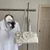 Bolsa de Ombro Texturizada Estilo Retrô para o Dia a Dia com Alça de Pérola e Laço 2026 Nova Moda Bolsa de Axila
