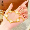 Pulsera de calabaza mariposa oro antiguo de alto color láser tienda de oro con joyería flash nicho lujo cuatro hojas