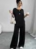 Conjunto de dos piezas para mujer transfronterizo, cuello redondo, un solo botón, top holgado de manga corta + pantalones de pierna ancha de cintura alta, conjunto casual holgado