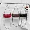 Bolso de mano brillante con brillo metálico para mujer 2026 verano nuevo celebridad de internet de moda bolso de axila de un solo hombro bolso cruzado de moda