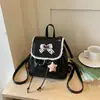 Mochila nueva y moderna de estilo coreano con ribete de encaje para mujer, con un aire relajado, estilo ballet nicho, adecuada para viajar y para el día a día