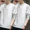 Temporada de primavera y otoño, camiseta lisa de manga larga popular, corte holgado, cuello redondo, camiseta interior para hombre, top simple y versátil
