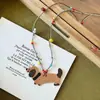 Collar Colgante de Cerámica de Cachorro de Dibujos Animados con Cuentas para Mujer Cadena de Sudadera Larga Ajustable de Colores Dopamina Accesorio Versátil