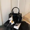 Bolsa de Mão Feminina de Luxo 2026 Nova Bolsa Quadrada Pequena Bolsa Transversal Simples Bolsa de Ombro Casual da Moda Bolsa Feminina Tendência