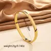Popular en Europa y América, el brazalete de acero inoxidable es moderno, versátil, no se decolora, con un toque de alta gama, incrustado con diamantes, elegante y sencillo brazalete de acero de titanio