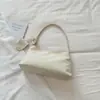 Bolso pequeño elegante y moderno de estilo fresco para mujer, novedad de principios de otoño 2026, bolso personalizado de un solo hombro para debajo del brazo, bolso tote pequeño de mano exquisito