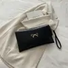 Bolso casual de moda estilo retro para mujer, nuevo bolso de mano de otoño 2026, bolso cuadrado pequeño versátil, bolso de mano de nicho versión coreana