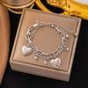 Europa y Estados Unidos suministro transfronterizo de pulsera nueva de acero de titanio al por mayor estilo bohemio amor multicapa acero inoxidable joyería de mano