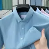 Camisa Oxford 100% Algodão 2026 Nova Moda Camisa Casual Simples e Confortável Cardigã Masculino de Manga Curta