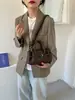 Bolso tote con estampado de lichi estilo commuting para mujer, bolso de hombro de cuero suave, nuevo modelo 2026, gran capacidad, sensación de alta gama, bolso de mano cruzado