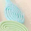 Peine Masajeador Color Caramelo Macarrón Peine Uso Húmedo y Seco Fabricante Mayorista Peine de Costilla Hueca Bobina de Mosquitos Huanyun Transfronterizo