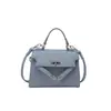 Colección Otoño 2026: Bolso nuevo, simple y moderno para mujer, con un diseño retro de moda, alto atractivo estético y un estilo versátil de hombro/cruzado en forma de cuadrado pequeño