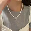 Collar de Lujo Ligero Estilo Nicho con Lazo y Perla, Colgante Swarovski, Cadena para Clavícula, Nuevo Modelo 2025