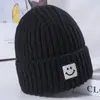 2024 sombrero mujer invierno cálido tejido estilo coreano moderno moda lindo sombrero exterior protección orejas engrosada sombrero de lana venta al por mayor