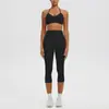 Conjunto deportivo de yoga con sujetador de yoga sin costuras de nuevo estilo transfronterizo con relleno incorporado, alta elasticidad, secado rápido y pantalones capri para correr