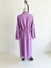 Colección de otoño 2026 europea y americana: Vestido largo blanco de alta gama, ajustado en la cintura, corte holgado, ropa para mujer talla grande, un artículo popular para ventas transfronterizas