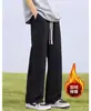 Jeans flare com forro de fleece preto direto da fábrica para homens, calças americanas de alta rua retas largas da moda de inverno para homens