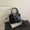 Bolso de Mano Pequeño de Alta Gama para Mujer 2026 Nuevo de Moda Versátil para el Trabajo Bolso de Hombro Lujo Ligero Elegante Bolso Cruzado