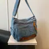 Bolso de mezclilla para mujer, gran capacidad, nuevo bolso casual de hombro y cruzado 2026, popular bolso tipo cubo para el día a día este año