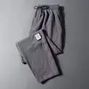Calças Casuais Masculinas Verão 2026 Novo Estilo de Hong Kong Finas Soltas de Perna Reta de Perna Larga Versáteis Esportivas Longas Roupas Masculinas