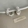 Pendientes de aro C geométricos minimalistas retorcidos para mujer, diseño único, pendientes de moda elegantes y con estilo