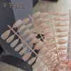 Medio taro nude usando una pieza de uña especial sin costuras esmerilada de color prefabricada de fábrica de uñas en stock al por mayor