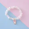 Pulseira de Pérolas Imitação Rachadas Popular Transfronteiriça para Crianças com Pingente de Cavalo-Marinho Desenho Animado Meteoro Pulseira Joias Atacado