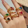 Set de anillos cúbicos de circonia de venta caliente transfronterizo, acero inoxidable, lujo ligero, alta gama, moda, anillos apilables para mujer al por mayor