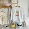 Oferta de Liquidação de Estoque Camiseta de Algodão Infantil para Meninas 2025 Outono Novo Cor Doce Blocos de Cor Desenho Animado para Meninas
