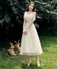 Vestidos de Dama de Honor en Stock para Mujer 2026 Nuevo Estilo Longitud Media Corte Entallado Elegante tipo Hada Vestido de Noche para Anfitriona